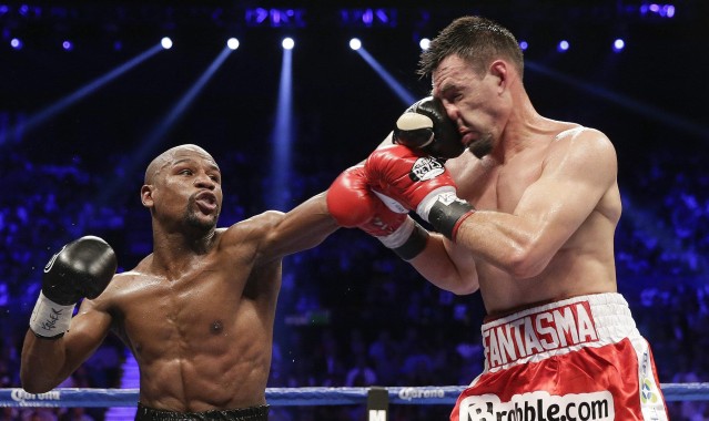 【爱游戏官网】UFC 300震撼落幕，新王登基，传奇对决载入史册